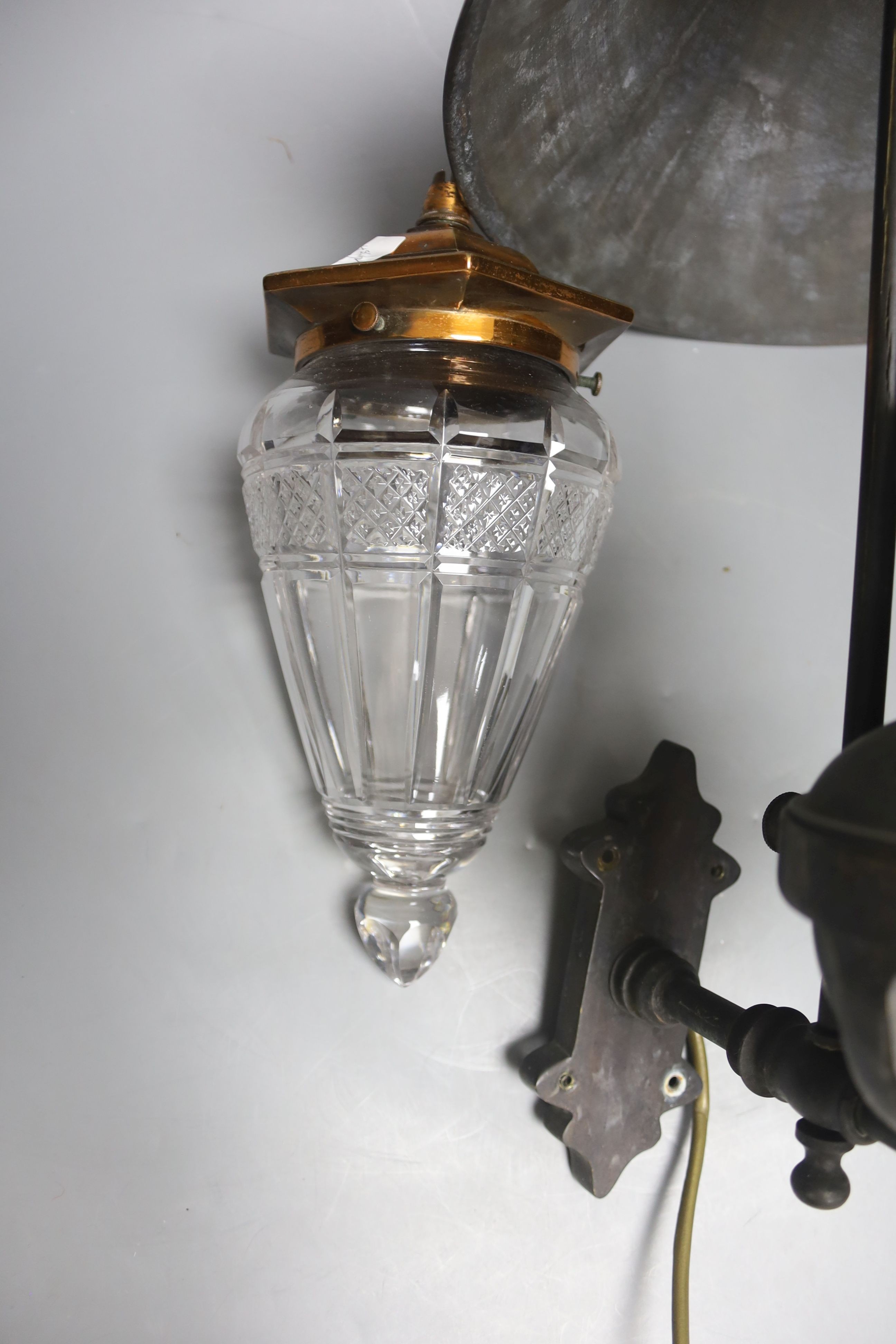 A Victorian brass gas light fitting and cut glass ceiling shade